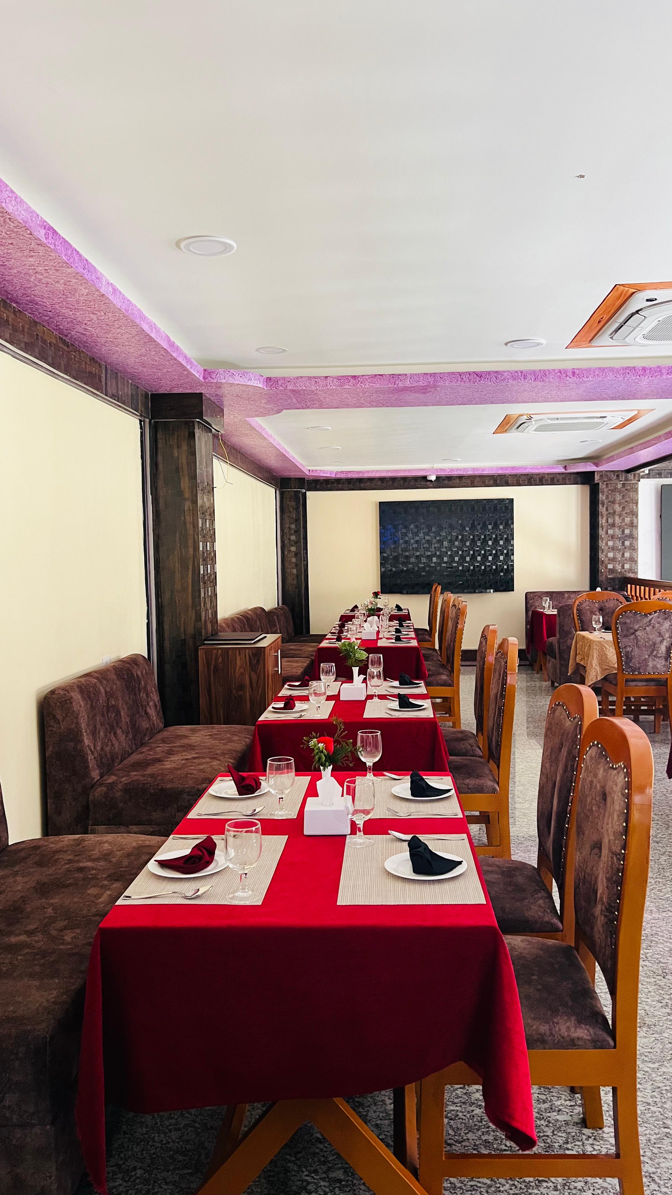 Fine dining table setup at Hilltower Hotel restaurant in Shree Antu, Nepal